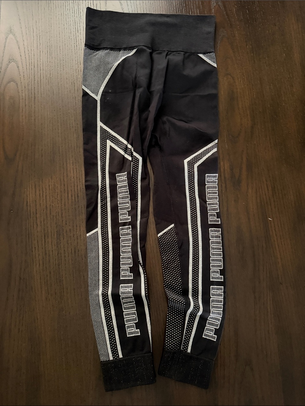 Puma Black Activewear with White Logo Tag